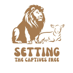 Logo of a lion and a cub with the text 'SETTING THE CAPTIVES FREE'.