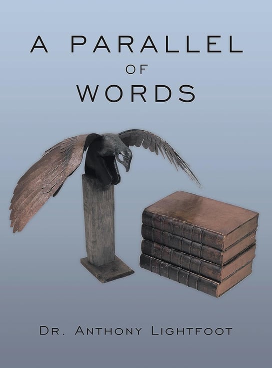 A sculpture featuring a bird with outstretched wings atop a pedestal next to stacked books.
